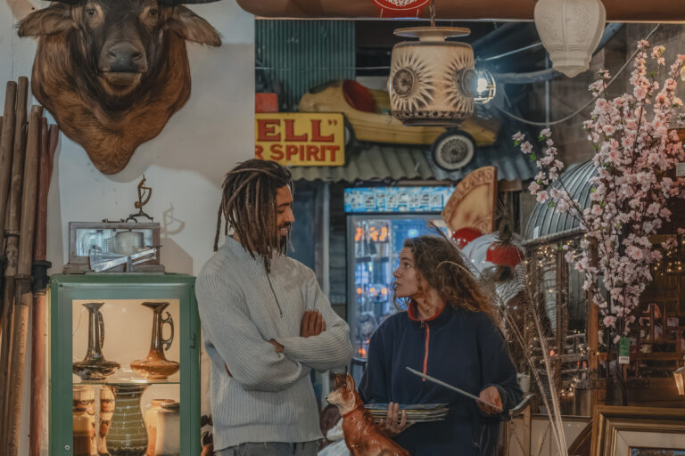 Young couple exploring the antiques and collectables