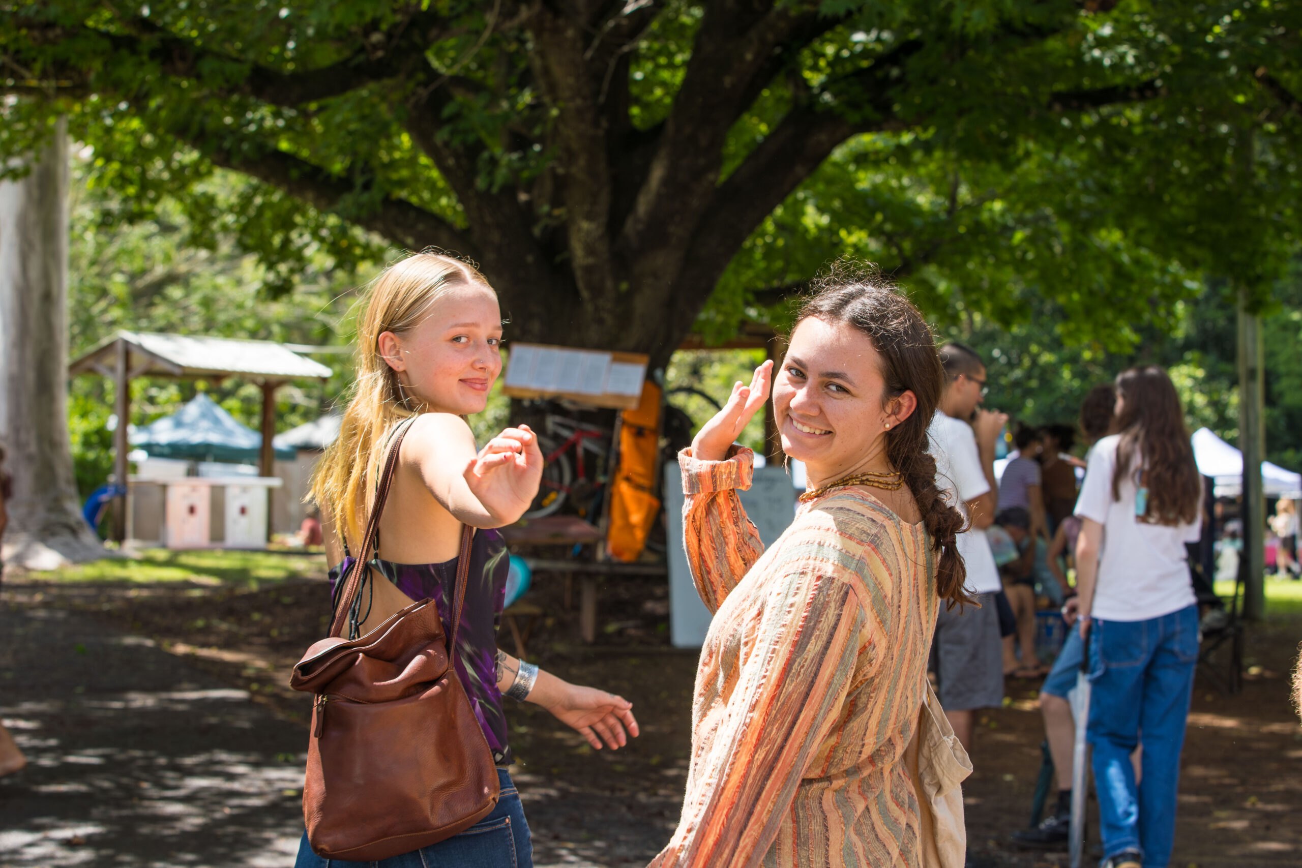 People waving at The Channon Markets.