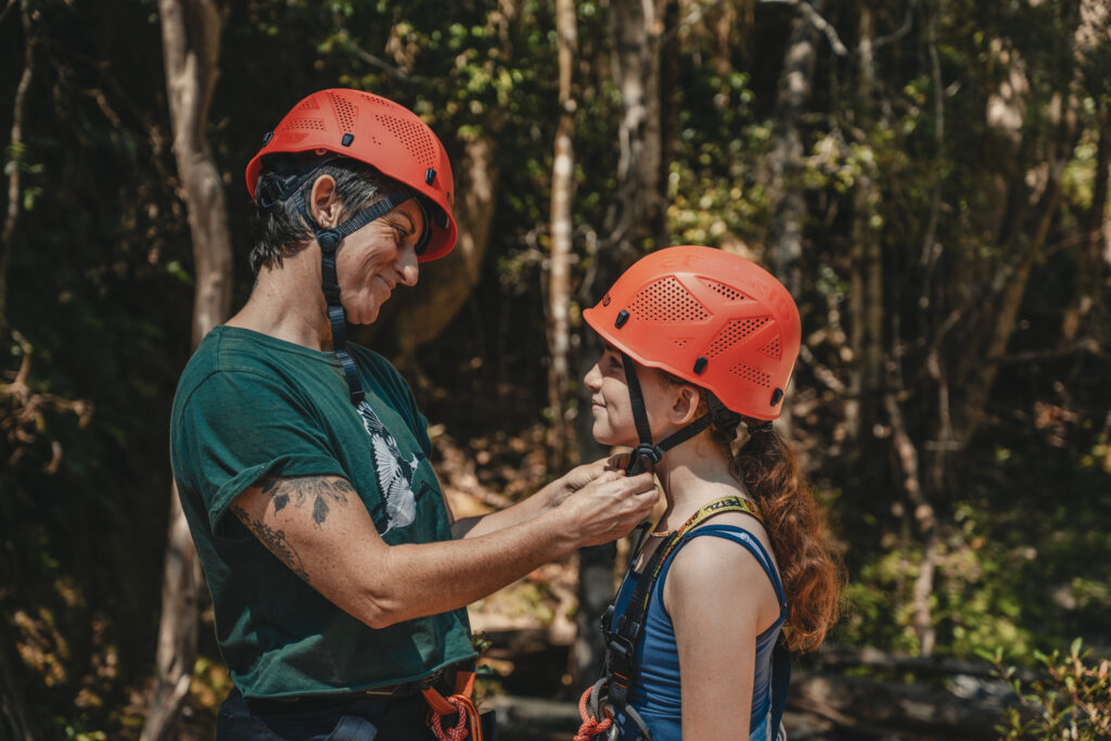 Mother and daughter getting ready to go abseiling