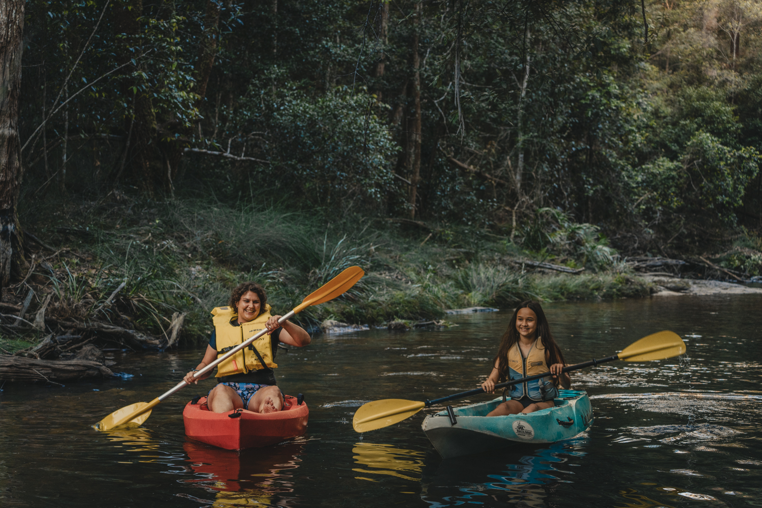 Two girls kayaking in Nightcap National Park